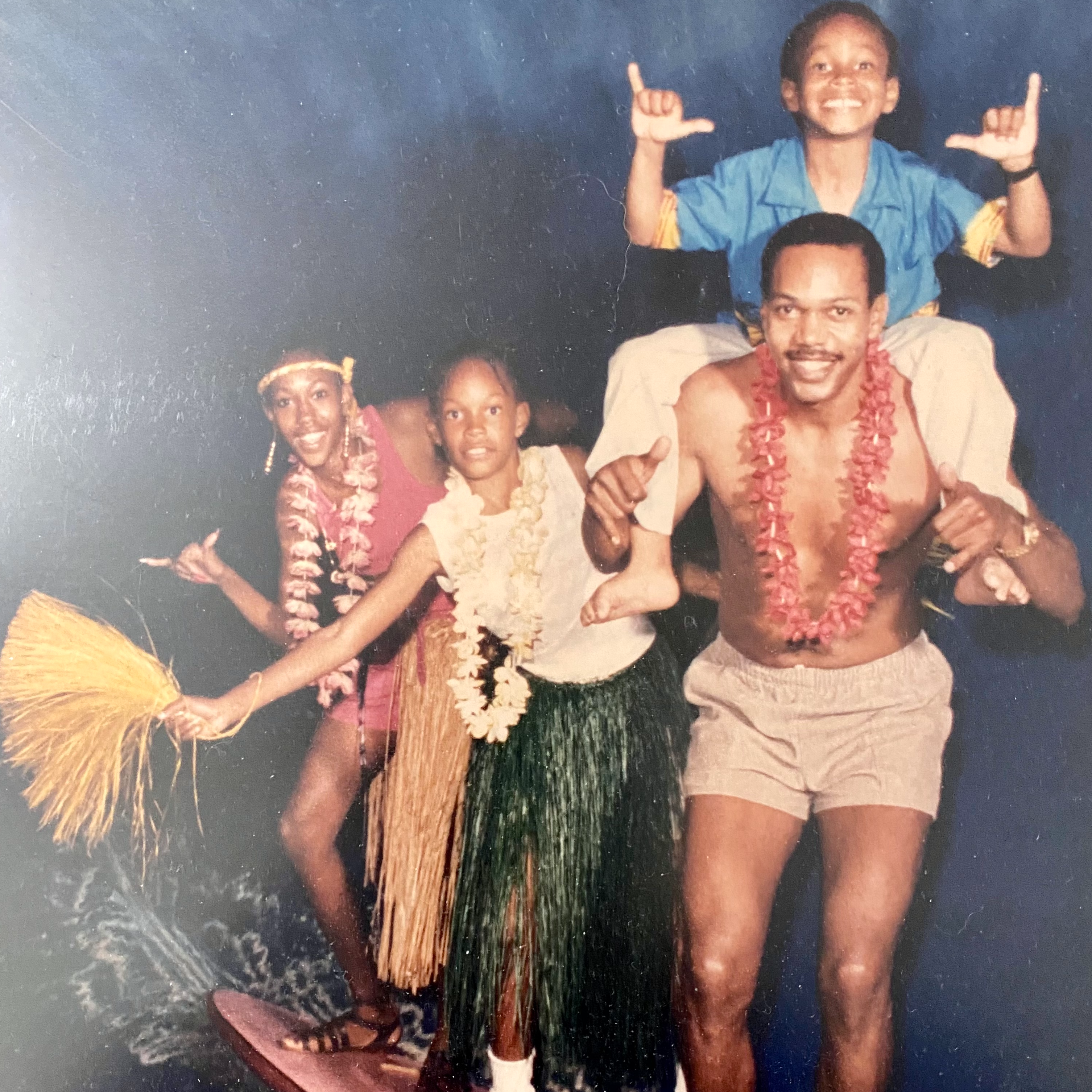 My father took us to Hawaii when I was 8 years old. We had so much fun! This is one of my favorite photos because it is so unique (you can't see that this is a surfboard we're standing on, in a giant wave), and because we had so much fun while we were there. It captures one of my favorite memories from childhood. RIP daddy!