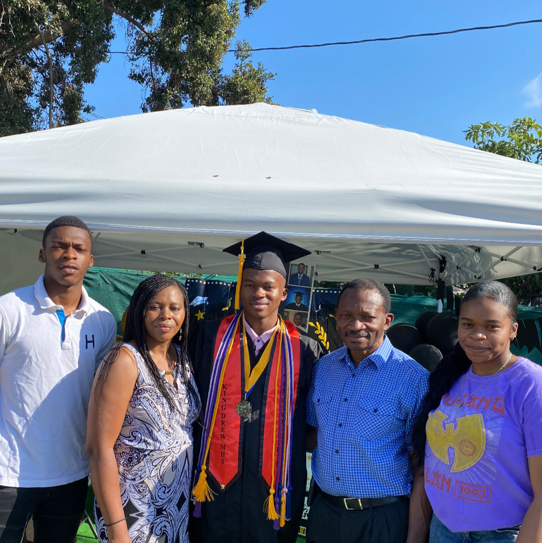 Mom Celebrating Chidi's graduation from highschool.